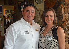 Husband and wife professionals Lock and Amanda Cleary network with new friends.