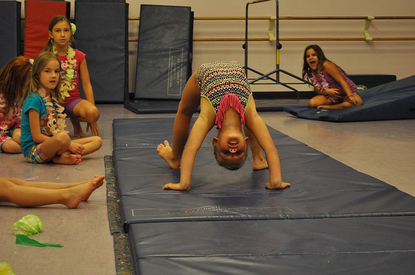 Judi Balot completes a bridge.