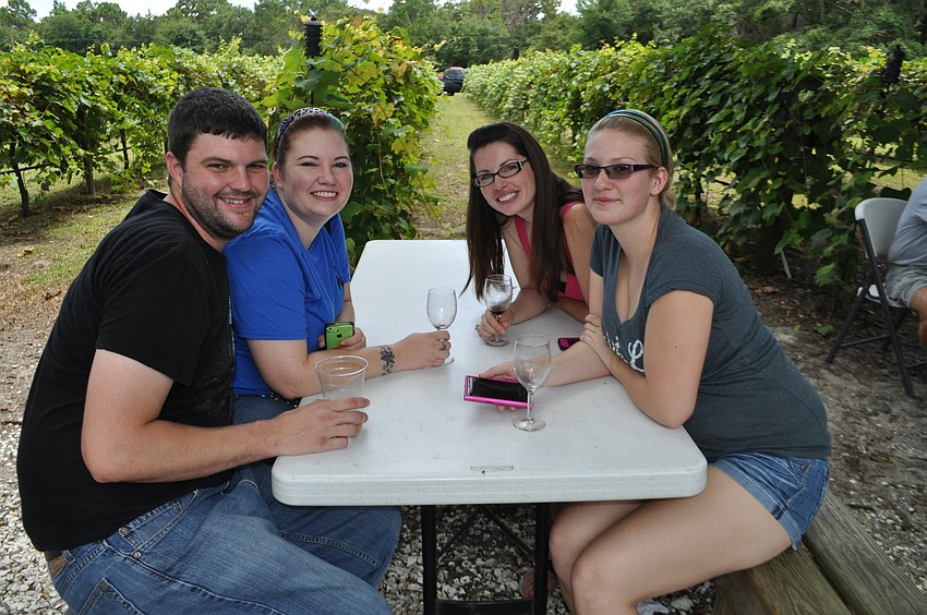 Clockwise from left: Steve McHugh, Marie Maxwell, Amy Urban and Tori Maxwell came out to the winery for the first time.