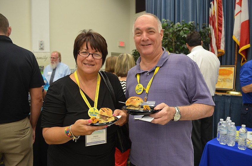 Joyce Gonzalez and Marty Weisberg from Lyoness America have a snack.