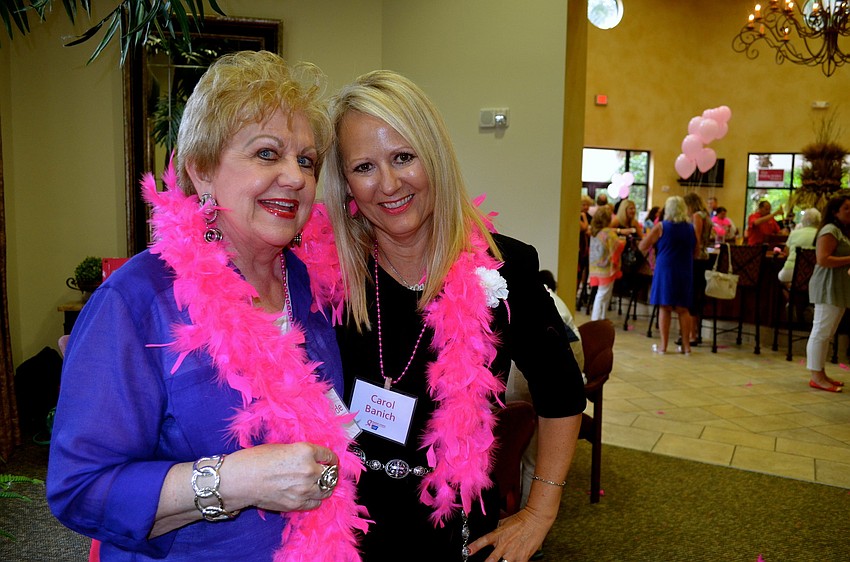 B.J. Burnside and Carol Banach show off their pink attire.