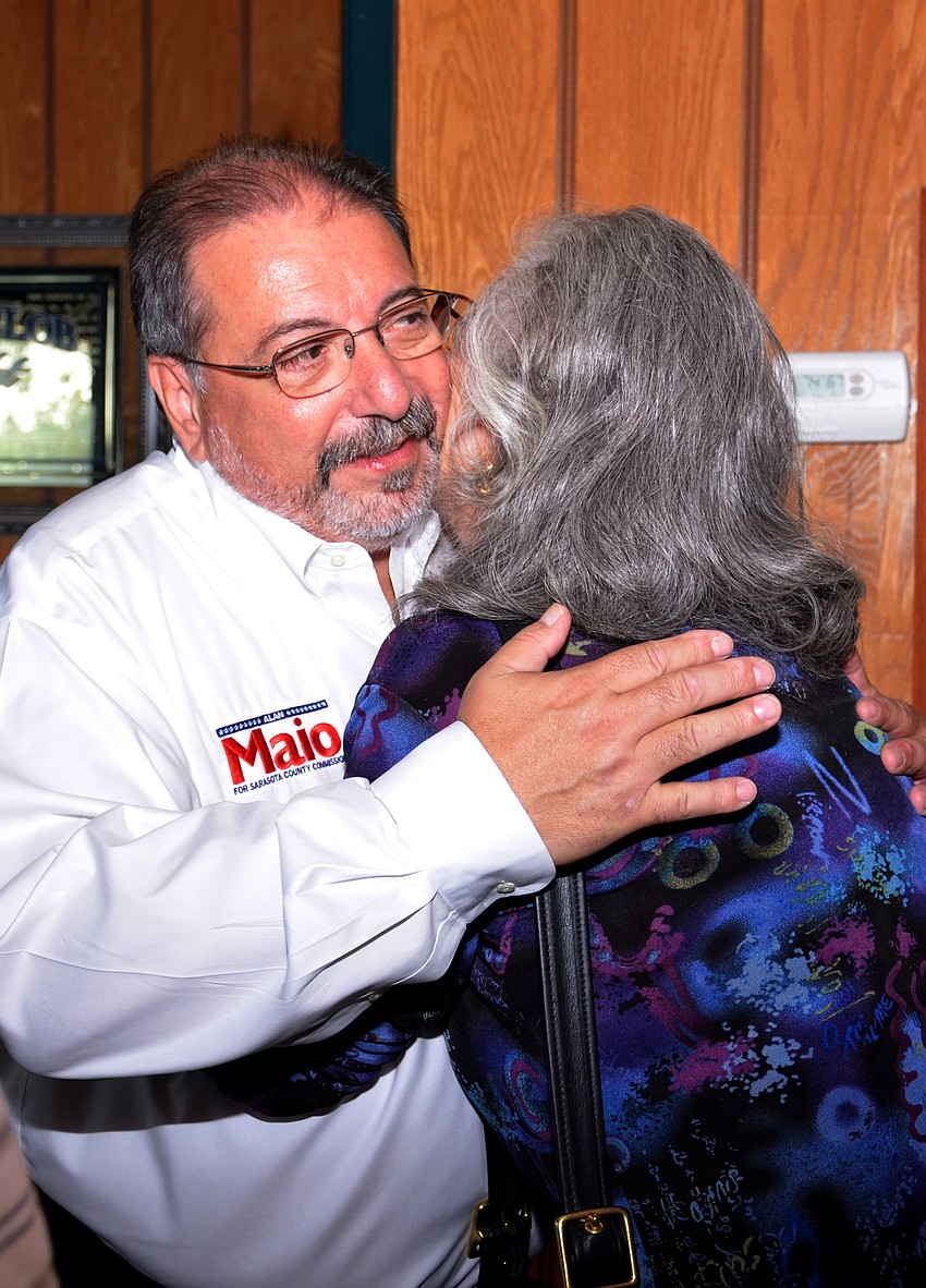 Victor Alan Maio, who was running against Lourdes Ramirez for the County Commission District 4 seat, greeted all his supporters with hugs and handshakes, including Pam Dillon, the wife of Bruce Dillon, who ran for Sarasota County Charter Review Board.