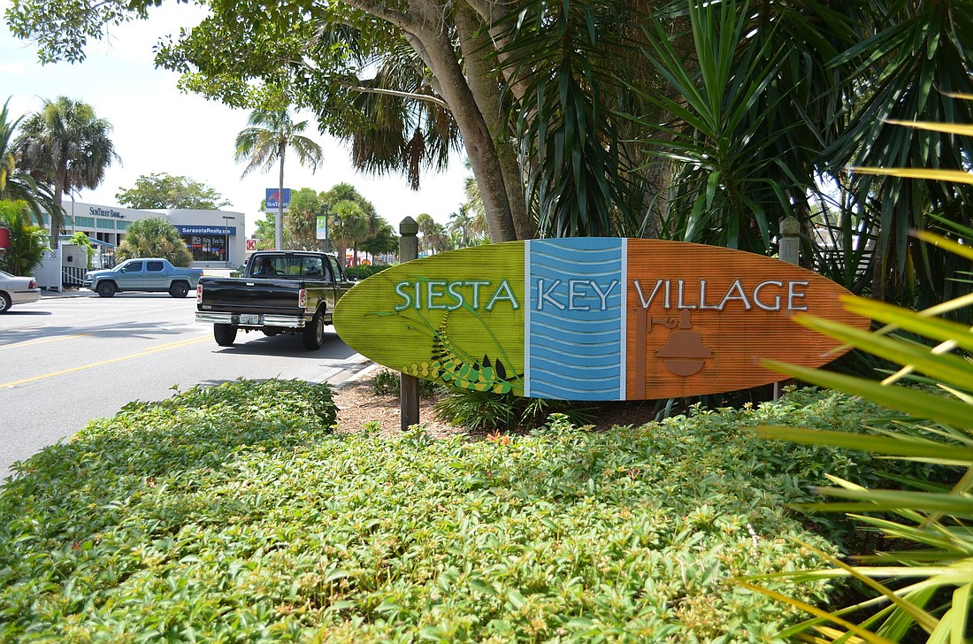 The new maintenance company, Buccaneer Landscape Management Inc., will offer more services than the previous firm, such as pressure washing sidewalks in Siesta Key Village. Jessica Salmond