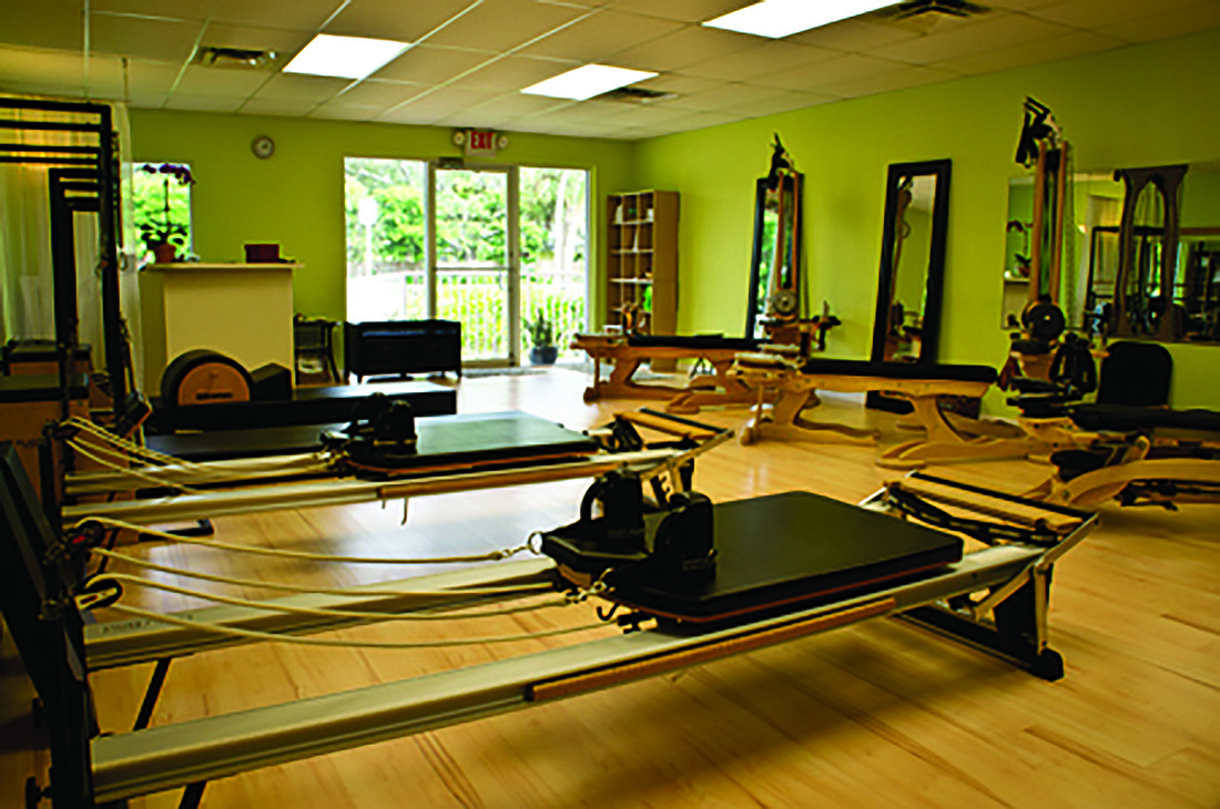 The Pilates Body studio with two reformers in the left foreground and Gyrokinesis equipment on the right. Courtesy photo