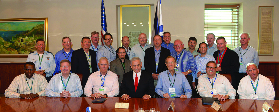 The group of retired U.S. military officials met with Prime Minister Benjamin Netanyahu, bottom right, and other Israeli officials. Courtesy photos