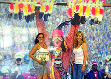 FAMILY FUN. Nuris Fanning and Karmen McGill brought their Observer along while attending the graduation ceremony for McGillâ€™s daughter, Megan (not pictured), from Florida State University in Tallahassee.