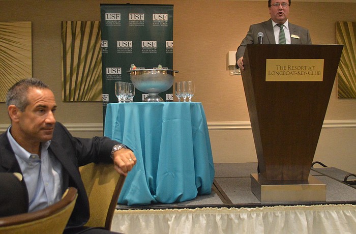 Key Club General Manager Jeff Mayers watches the crowd Wednesday as USF Hospitality and Technology Dean Cihan Cobanoglu speaks about their partnership.