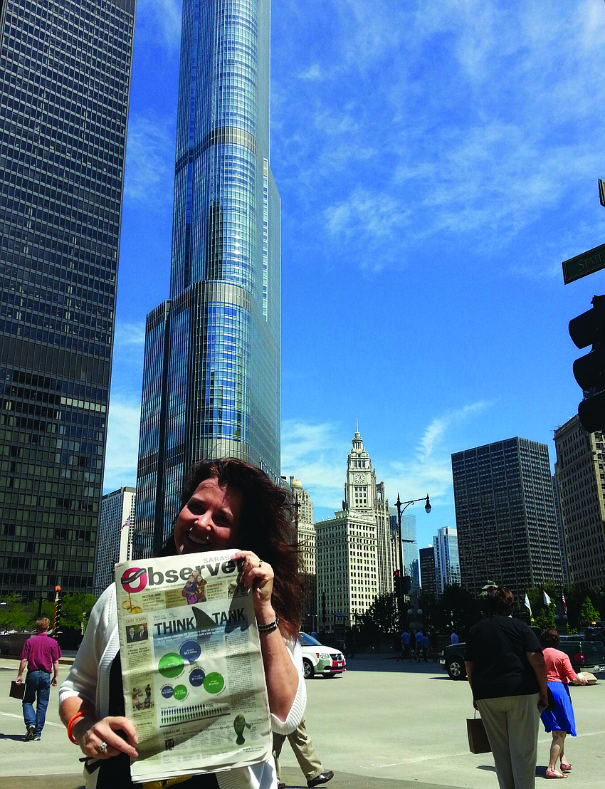 TALL TALE. Laura Coyle of All Faiths Food Bank brought her Sarasota Observer to the Feeding America Conference in Chicago.