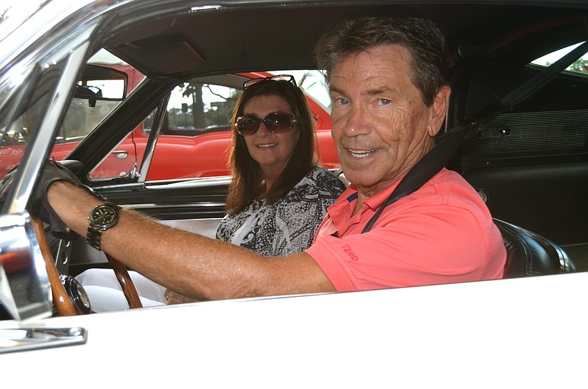 Lloyd and Debra Hartline drive off in their '67 Shelby Cobra.