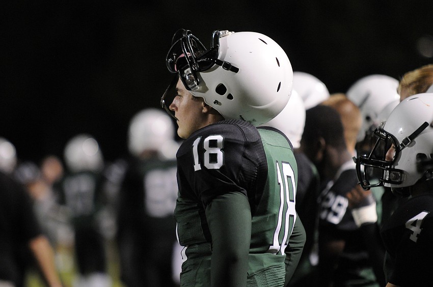 Lakewood Ranch backup quarterback Grant Weisman looks on as the Mustangs offense takes the field.
