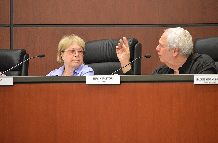 Commissioners Pat Zunz and Irwin Pastor discuss the formation of the town's new retirement board at their Sept. 8 meeting.