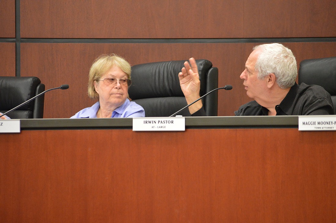 Commissioners Pat Zunz and Irwin Pastor discuss the formation of the town's new retirement board at their Sept. 8 meeting.