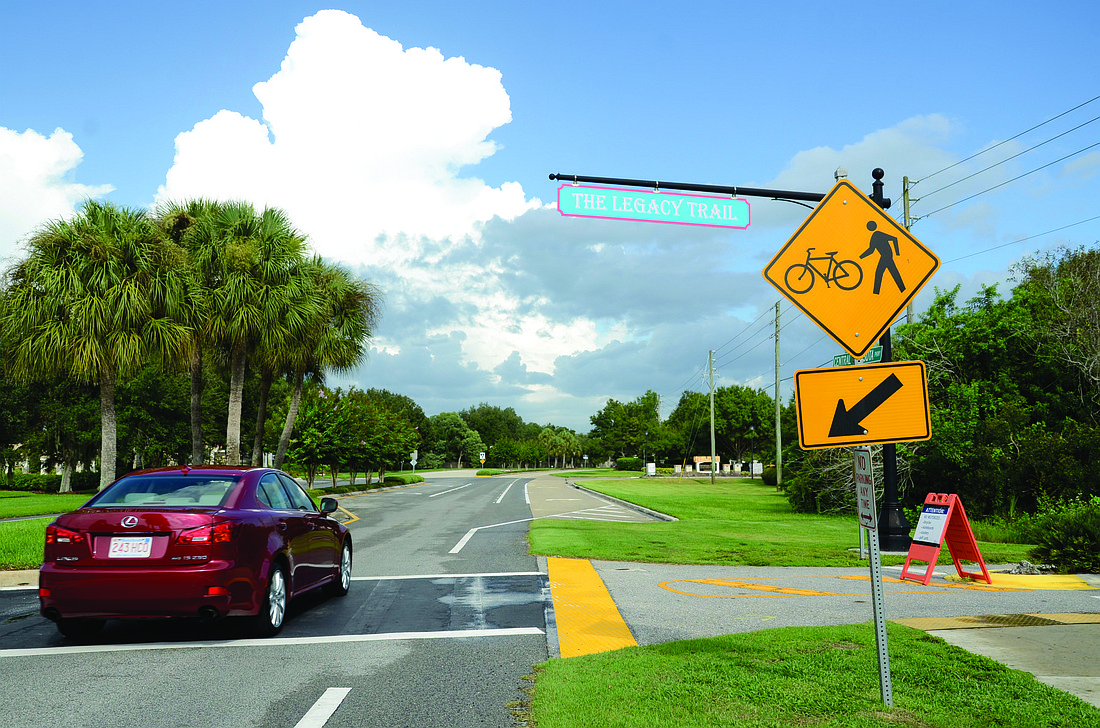 Some drivers speed through the intersection of Central Sarasota Parkway and Legacy Trail while others slow to check for oncoming bicyclists and pedestrians. Photo by Jessica Salmond