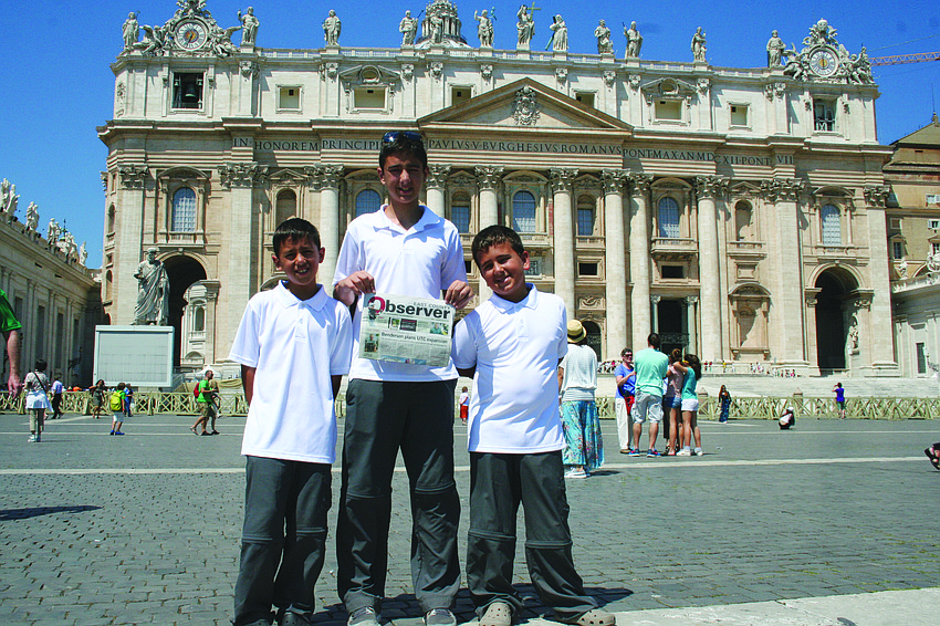 VATICAN VACATION. Andrew, Anthony, and Nicholas Sevarino brought their East County Observer along while sightseeing at St. Peterâ€™s Basilica in Vatican City, Rome.