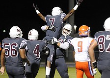 Braden River wide receiver Justin Ross celebrates with his teammates following his 16-yard touchdown catch in the third quarter.