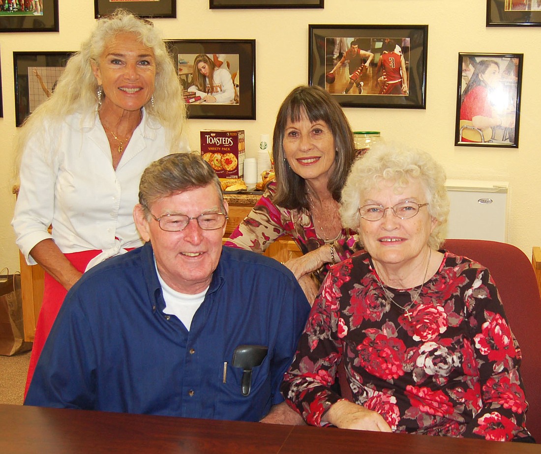 Alumni Tom and Nancy Goldsworthy, front;  Alicia DeMirza, left; and Paula Shigley, behind.