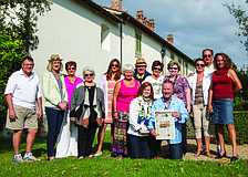 CIAO DOWN. Gulf Coast Connoisseur Club members enjoyed reading their Longboat Observer while staying at the Ferragamo Family Estate in Tuscany, Italy.
