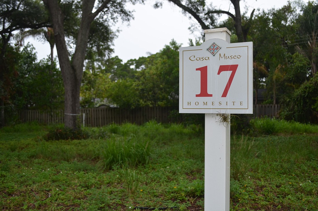 Markers for the Casa Museo housing development sit on the 8.4 acres of land that Indian Beach/Sapphire Shores residents had hoped would become a public park. Photo by David Conway