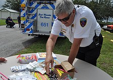 East Manatee Fire Rescue Fire Inspector Troy Toman chats with children.