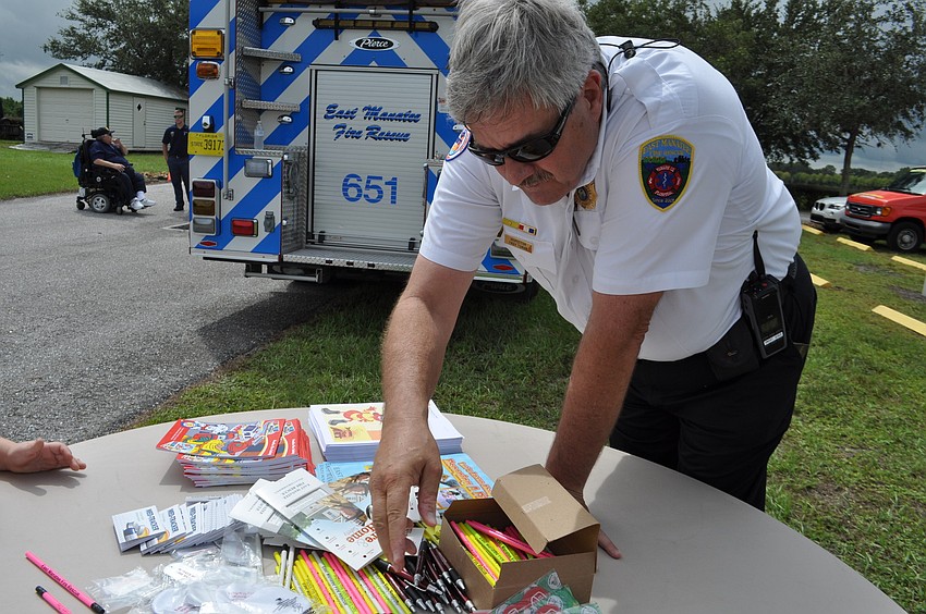 East Manatee Fire Rescue Fire Inspector Troy Toman chats with children.