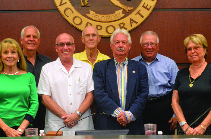 Commissioners Lynn Larson and Irwin Pastor, Vice Mayor Jack Duncan, Commissioner Phill Younger, Mayor Jim Brown and commissioners Terry Gans and Pat Zunz. Photo by Caleb Motsinger