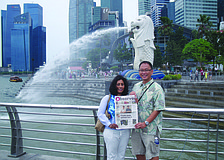 BREEZY TRIP. Tara residents Jay and Paul Khoo enjoy the breeze and spray at Merlion Park in Singapore.