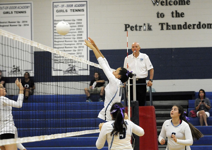 ODA senior Reanna Gregory sends the ball back over the net in the first set.