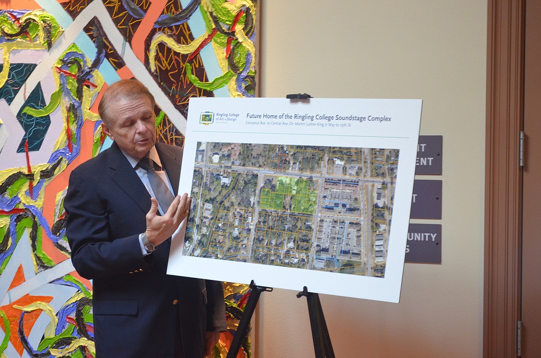 Ringling College President Larry Thompson outlines the location of the city block-sized film complex the school plans to build. Photo by David Conway
