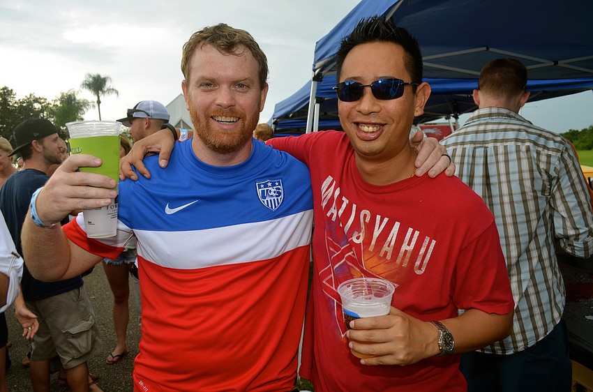 Ed Royer and James Wong taste test craft beers.