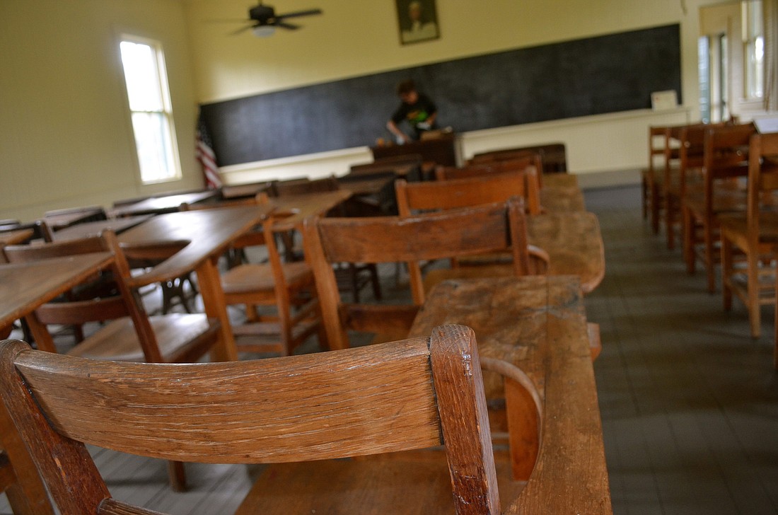 The schoolhouse still has original and donated desks inside. Photo by Amanda Sebastiano