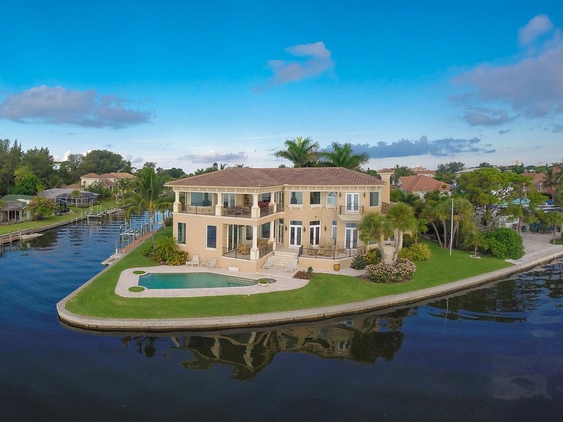 The home, located at 640 Rountree Drive, includes more than 200 feet of frontage on the bay.