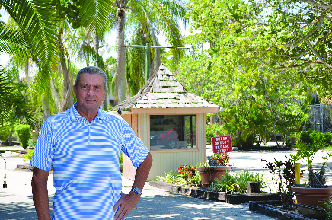 Manfred Welfonder stands in front of the shuttered Colony Beach & Tennis Resort, where he used to play tennis. Photo by Robin Hartill