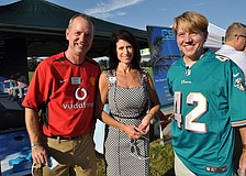 Clifton Aiken, of Capital Solution Services, joined Jennie Lucier, of Alltrust, and co-worker Michael Williams, also of Capital Solution Services.