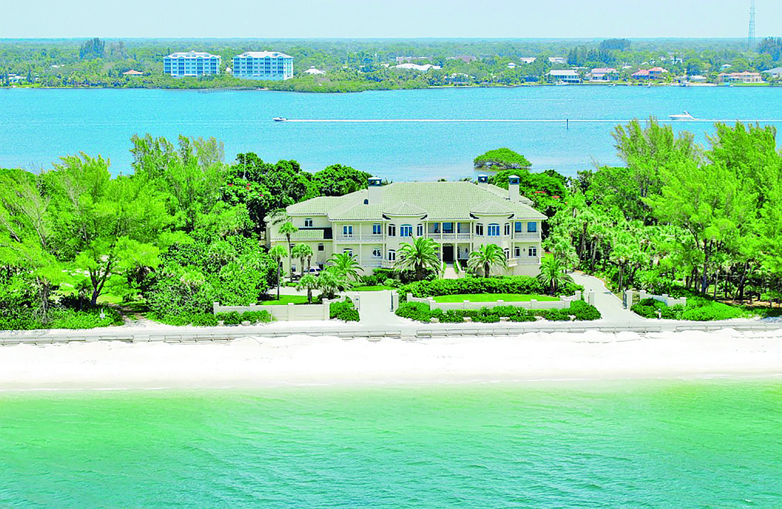 Two homes at 712 N. Casey Key Road have a total of more than 15,000 square feet. They sold for $8 million. Courtesy photo