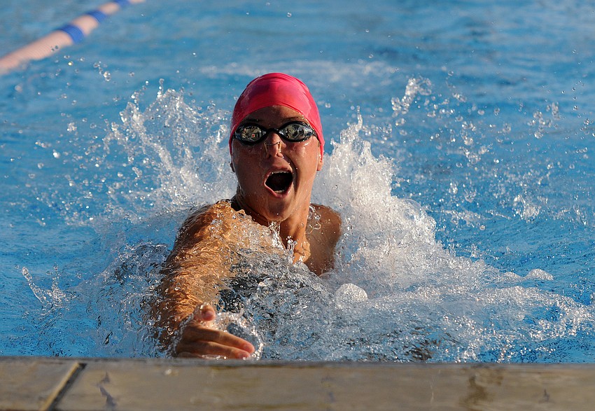 Cardinal Mooneyâ€™s Matthew Garcia makes the turn and heads for the finish line in the boys 200-yard individual medley.