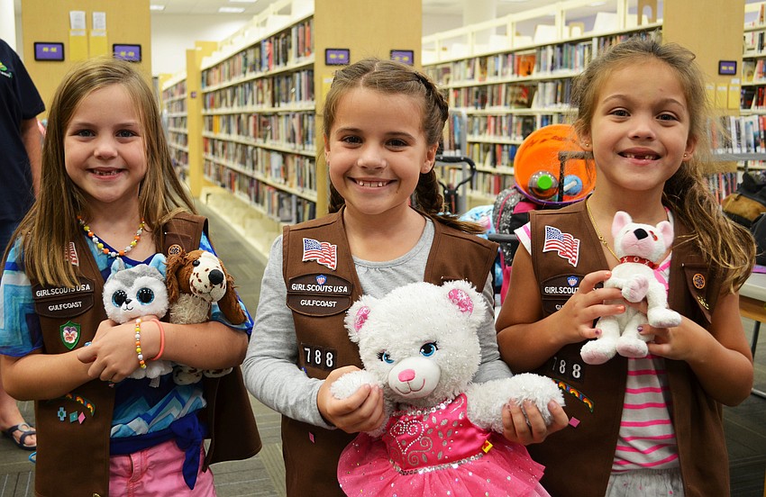 Meredith Carroll, Abbi Geiger and Lilly Irelan made sure to bring their favorite stuffed animals for the sleepover at Selby Library.