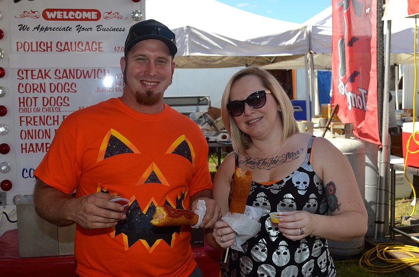 Joe Higgins and Tiffany Barnhill make time for a snack.