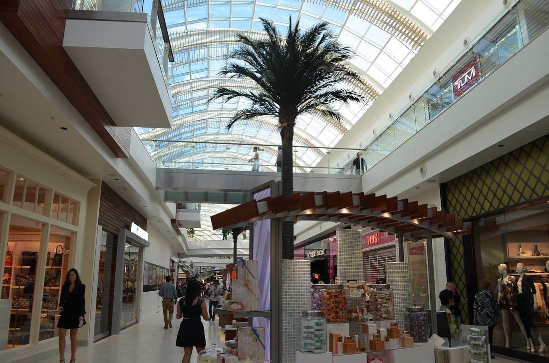 Shoppers walk the mall's interior for the first time Thursday.