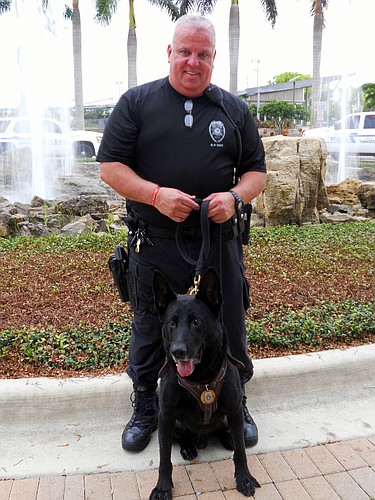 Sgt. Michael McHale with K-9 officer Nero.