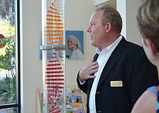 Executive Director, Doug Staley welcomes guest to the Child Protection Center for the Pillar of Hope Tasting and Awareness open house.