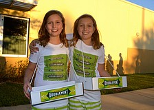 Doublemint twins Lindsey and Brooke Mitchel sport matching costumes.