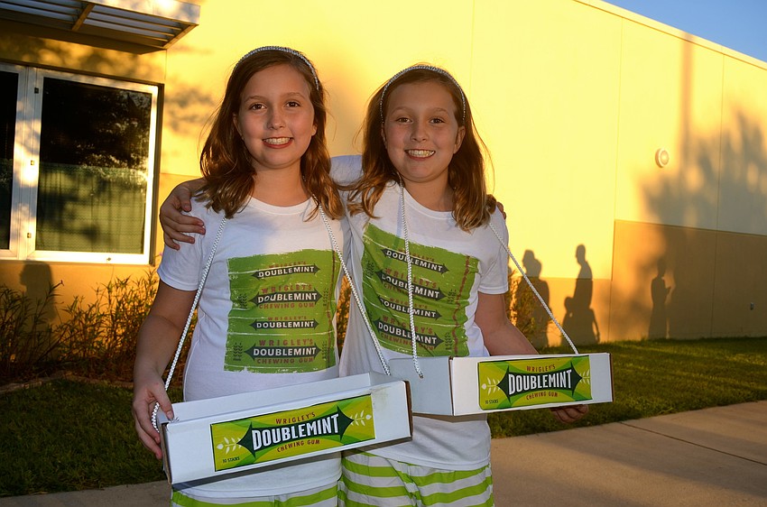 Doublemint twins Lindsey and Brooke Mitchel sport matching costumes.