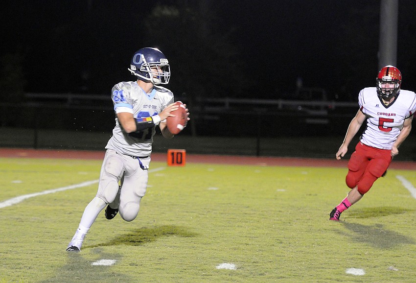 ODA senior quarterback Austin Hoppe drops back for a pass in the first half.