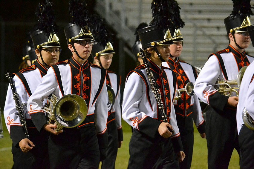 The Sarasota High School marching band takes the field during halftime for the Homecoming game.