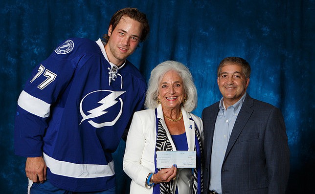 Graci McGillicuddy was presented with a $50,000 check from Tampa Bay Lightning owner Jeff Vinik and player Victor Hedman. Photo courtesy Tampa Bay Lightning Community Heroes program.
