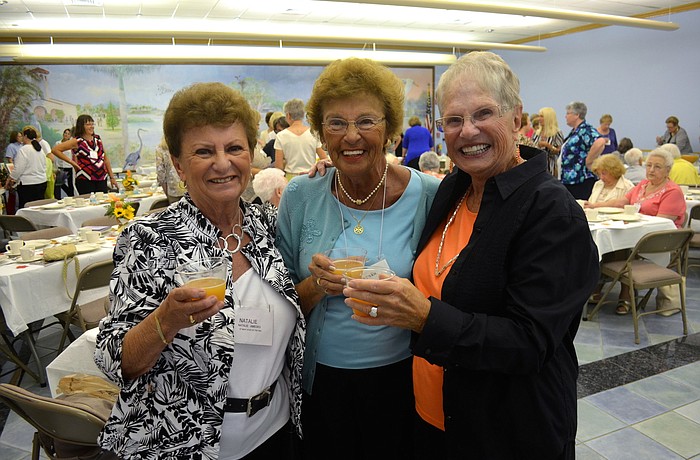 Natalie Amedeo, Esther Cook and Dionne Reinert cheers to the fall season.