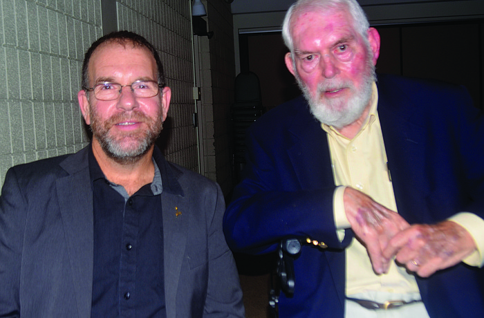 Jonathan Dekel-Chen and Plymouth Harbor resident Marlow Cook, a former U.S. senator from Kentucky, talk at the lecture Friday. Photo by Caleb Motsinger