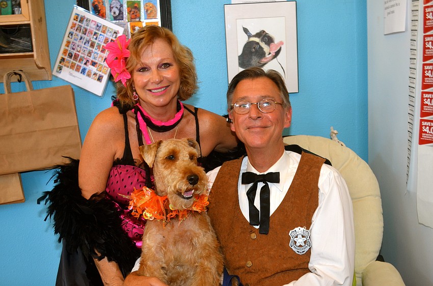 Michelle and Eric Wise with their furry friend â€” Rex.