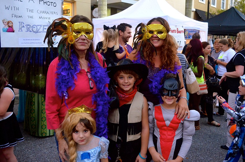 Stanka Petrovich dresses up with Marija, Mila, Jovan and Kristina Djurich.