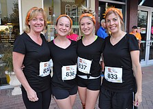 Diana and Sarah Dill run with Shelby and Lynne Roskamp.